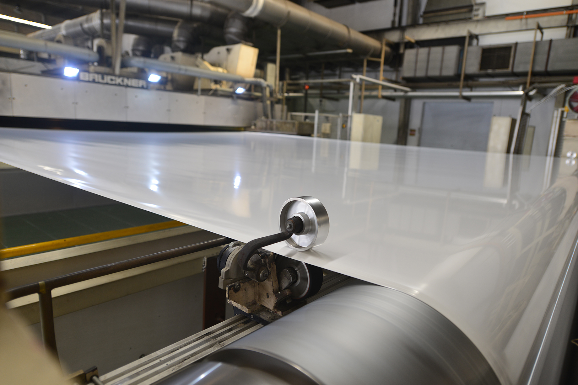 Film material moving through HSF production equipment